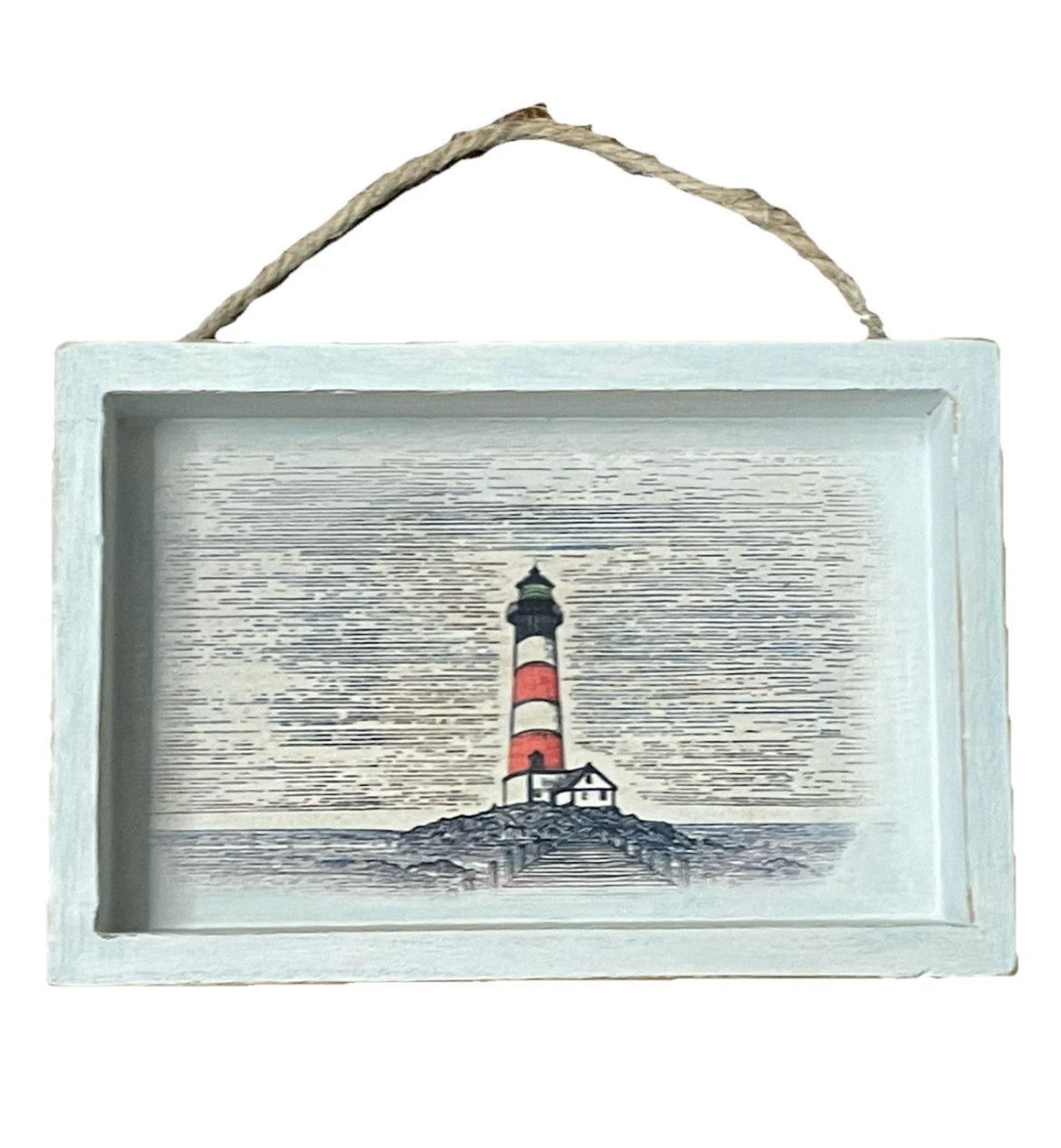 Decorative wall art with a lighthouse on a white background