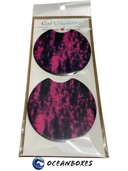 Packaged car coasters with pink and black design, brand 'Oceanboxes' visible.