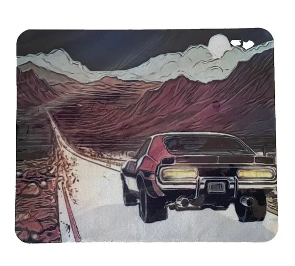 Illustration of a car on a mountain road with a moonlit sky.