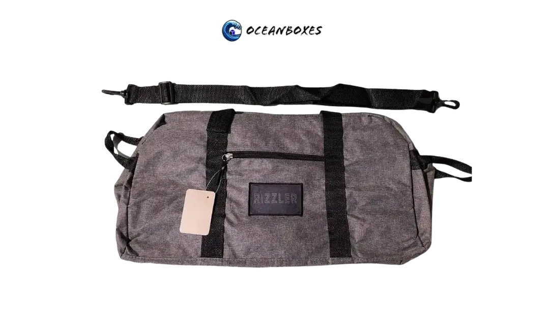 Rizzlwr patch on a Gray duffel bag with black straps and Oceanboxes logo on a white background