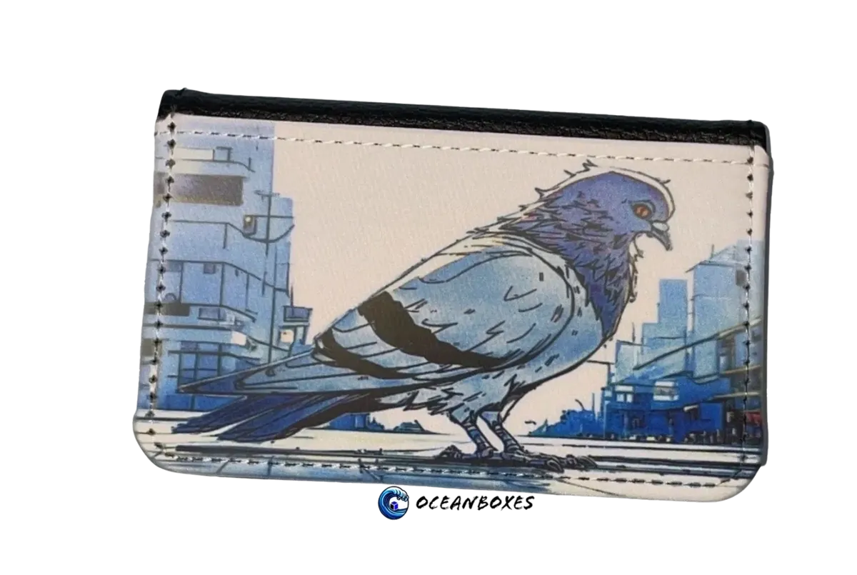 Small pouch with a blue pigeon design on a cityscape background, featuring the brand 'Oceanboxes'.