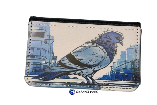Small pouch with a blue pigeon design on a cityscape background, featuring the brand 'Oceanboxes'.
