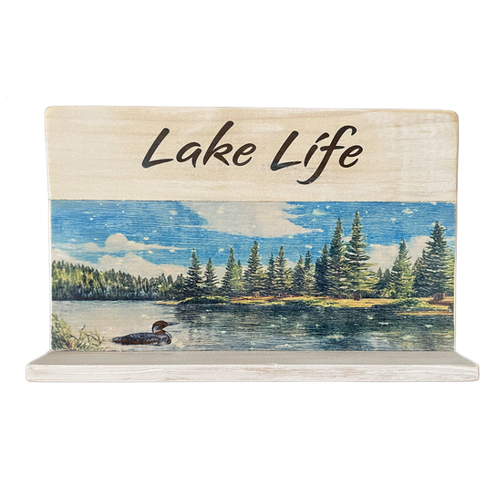 Decorative sign with 'Lake Life' text and a lake scene on a white background