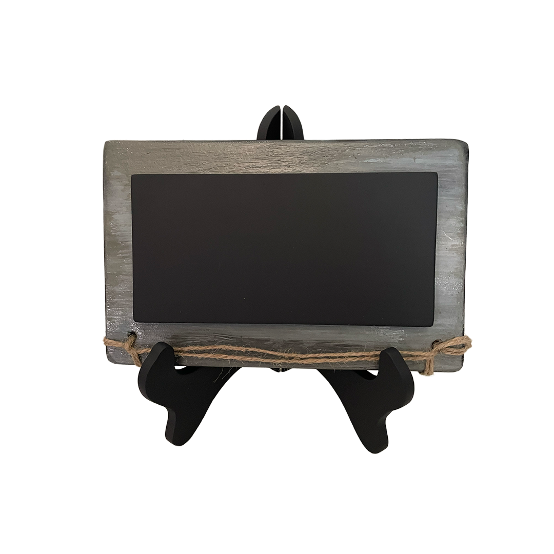 Small blackboard with wooden frame and stand on a white background