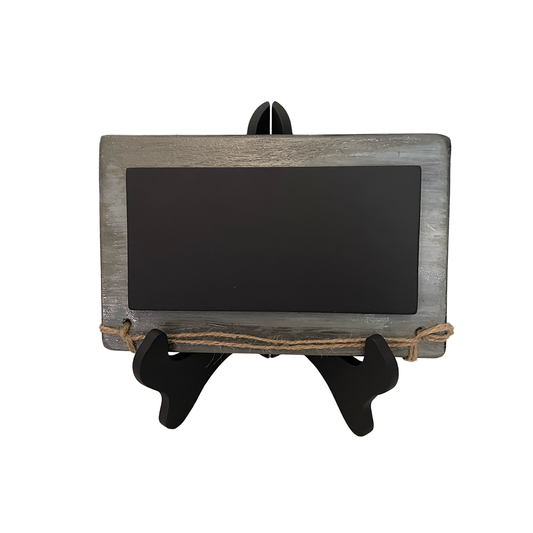 Small blackboard with wooden frame and stand on a white background