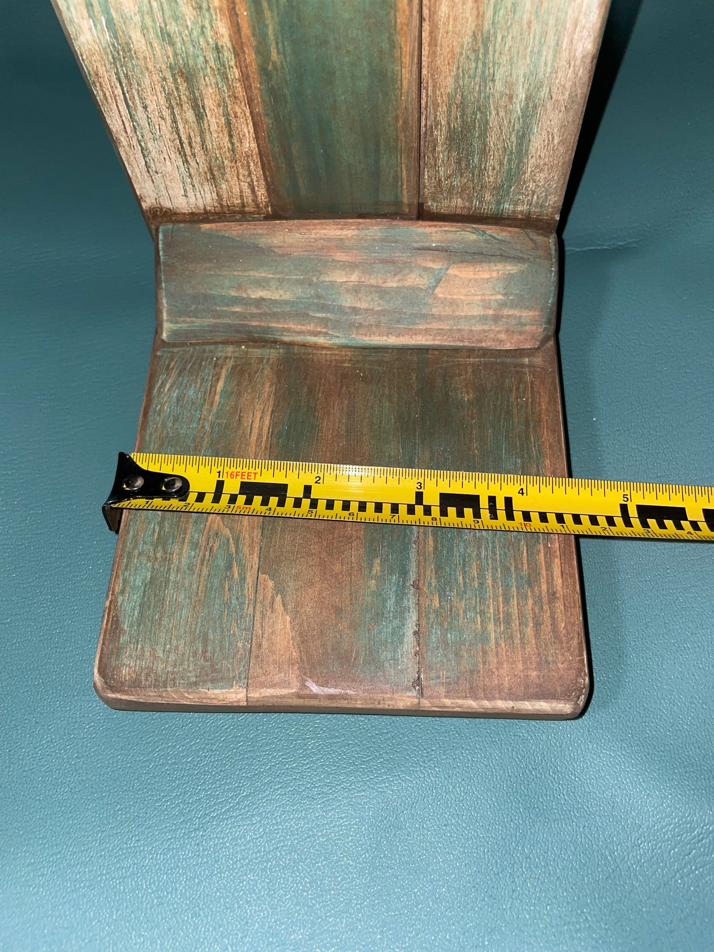 wooden plant stand base with a measuring tape